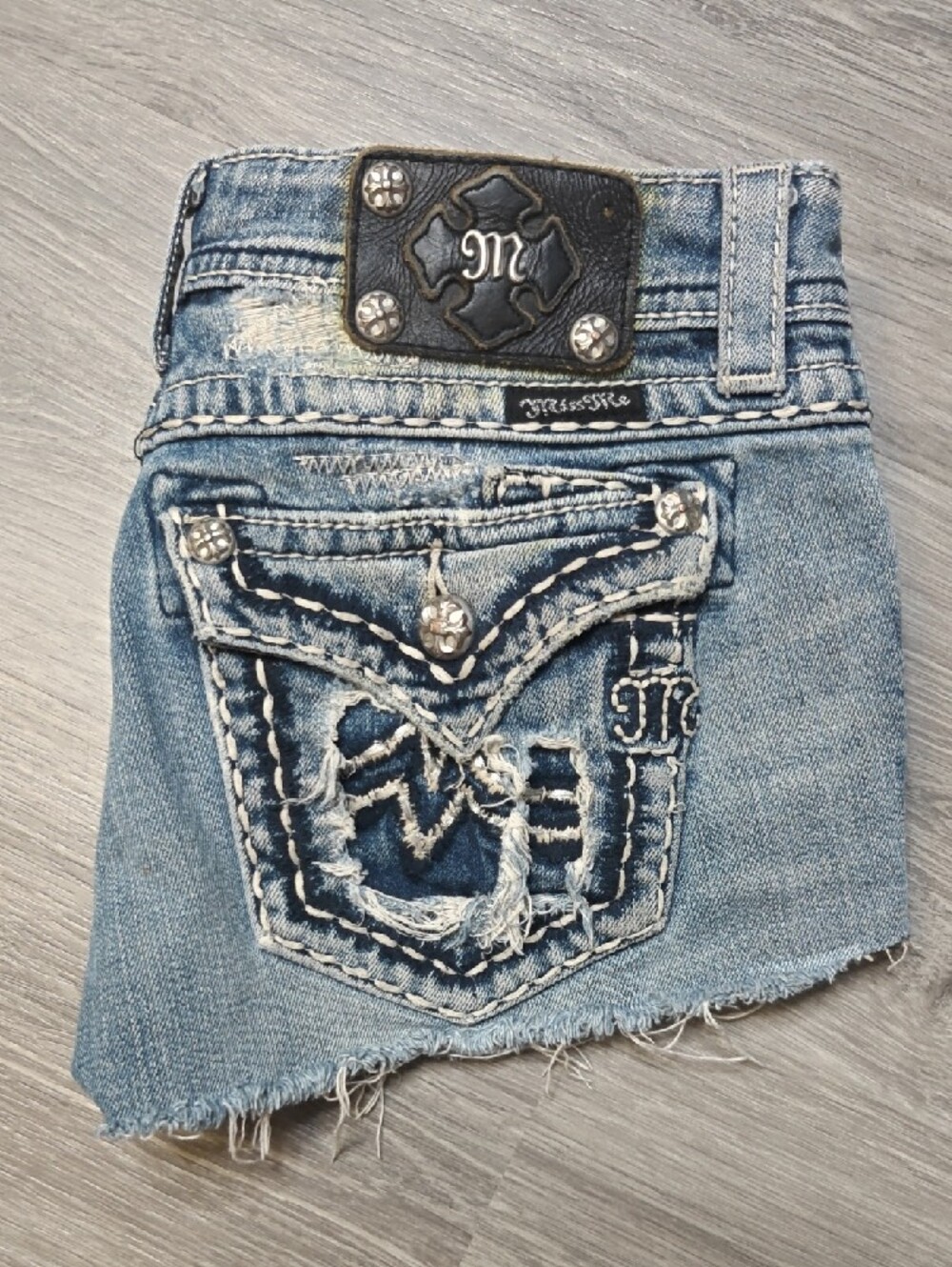 Distressed Light Blue Denim Bermuda Shorts
